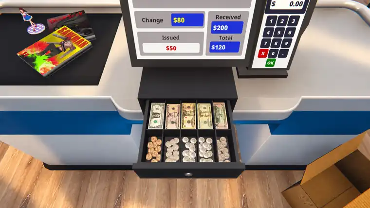 The register screen showing total, cash received and change due above an open cash drawer